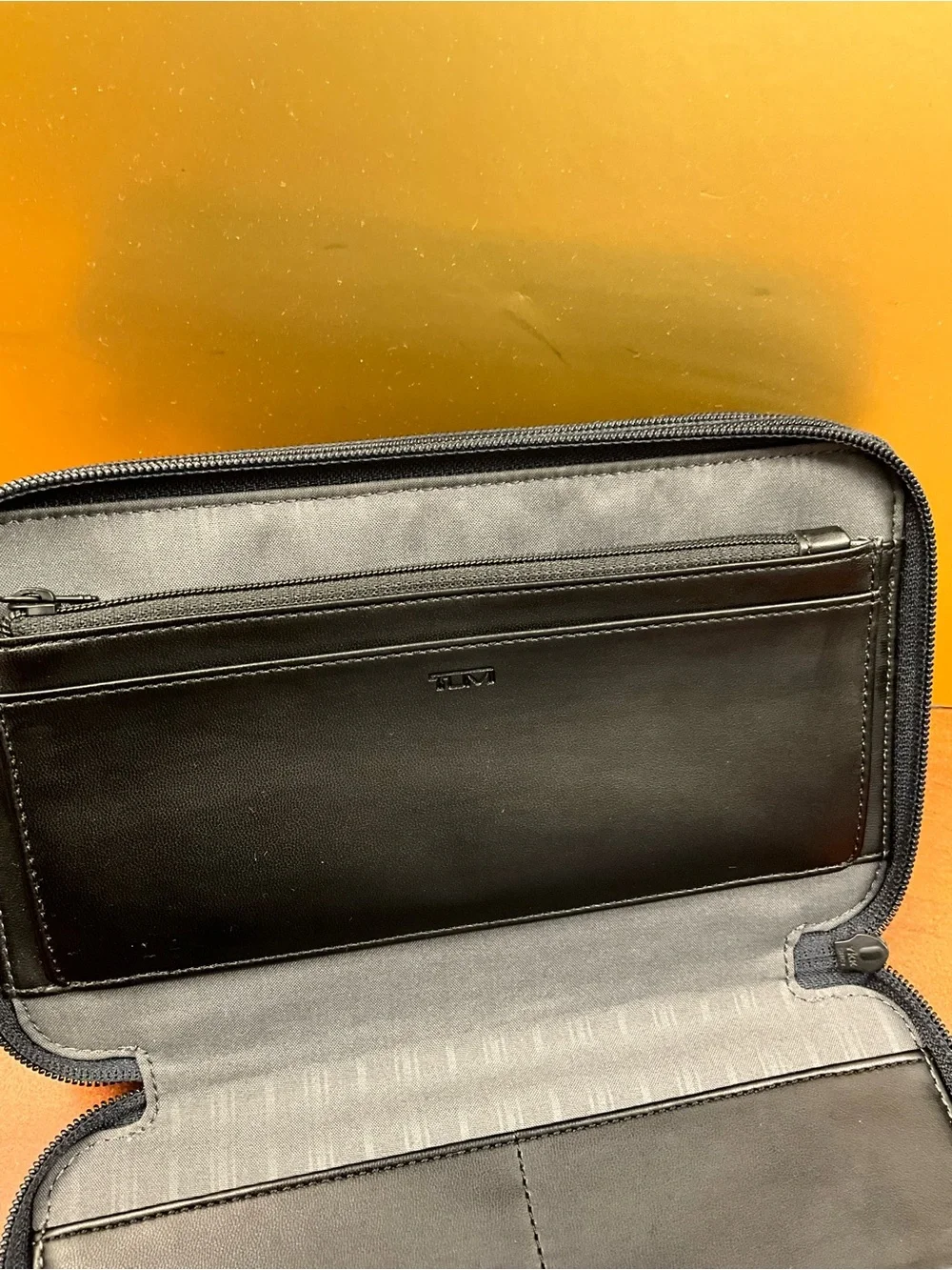 Tumi Navy Leather Toiletry Wrist Pouch